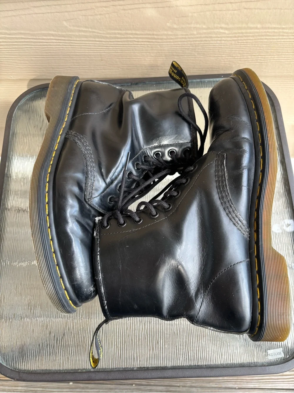 Dr. Martens Black Leather 8-Eye Combat Boots with Yellow Welt Stitching